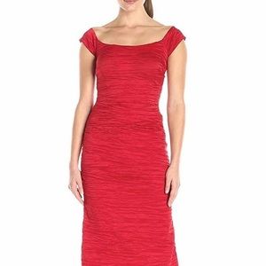 Red, off the shoulder long formal gown.